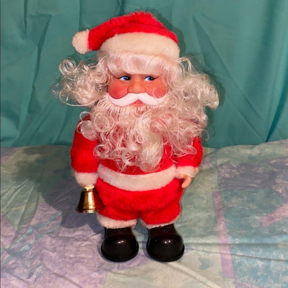 Vintage walking Santa Claus Doll with Bell, unknown working condition